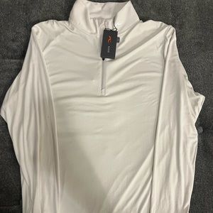 KJUS golf pull over quarter zip brand new with tags.